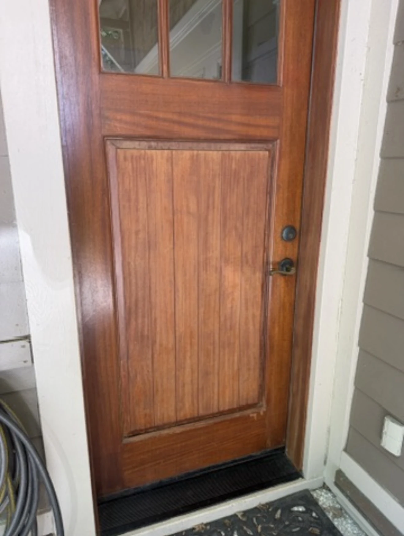 Wood entry door before restoration