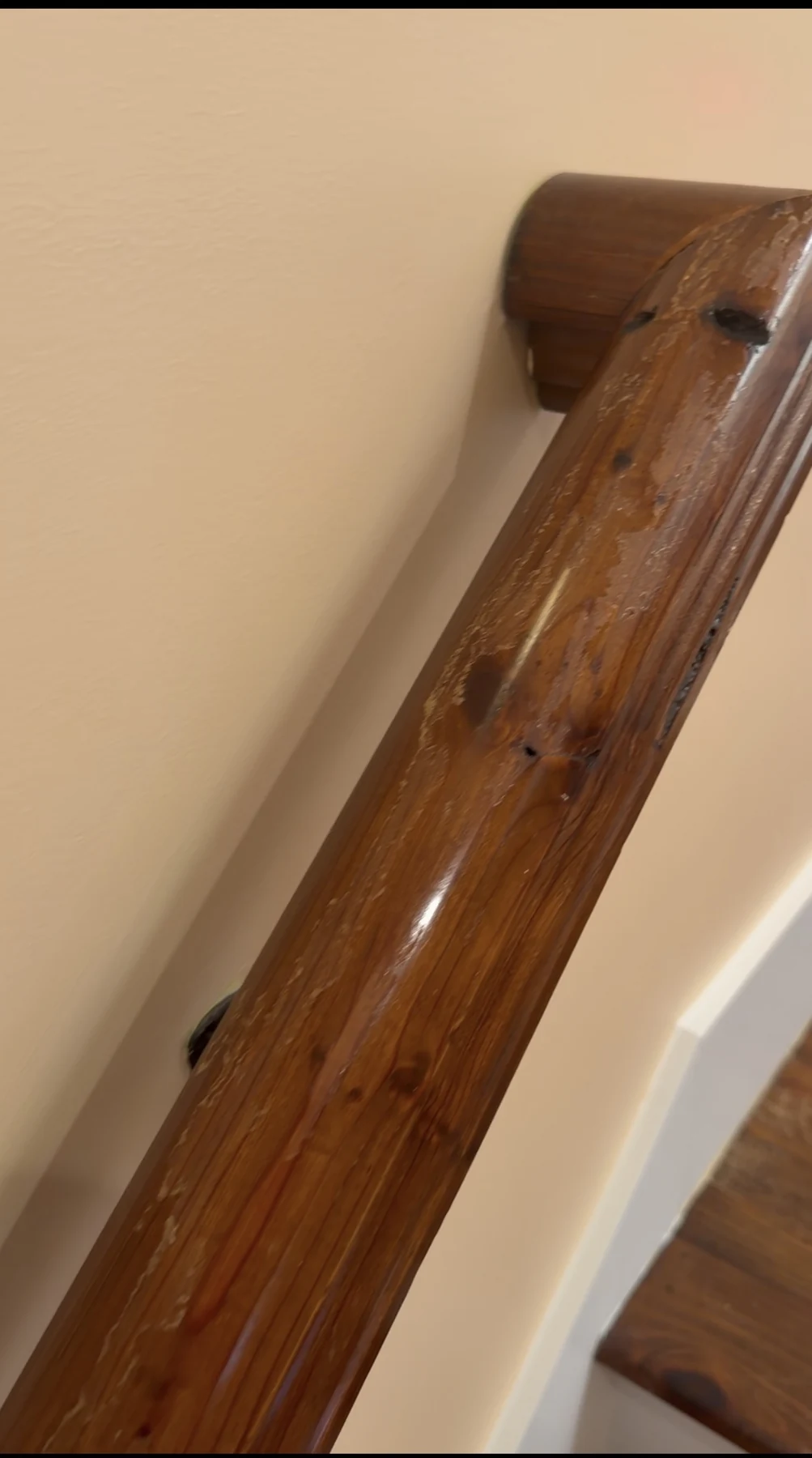 Wood handrail before restoration