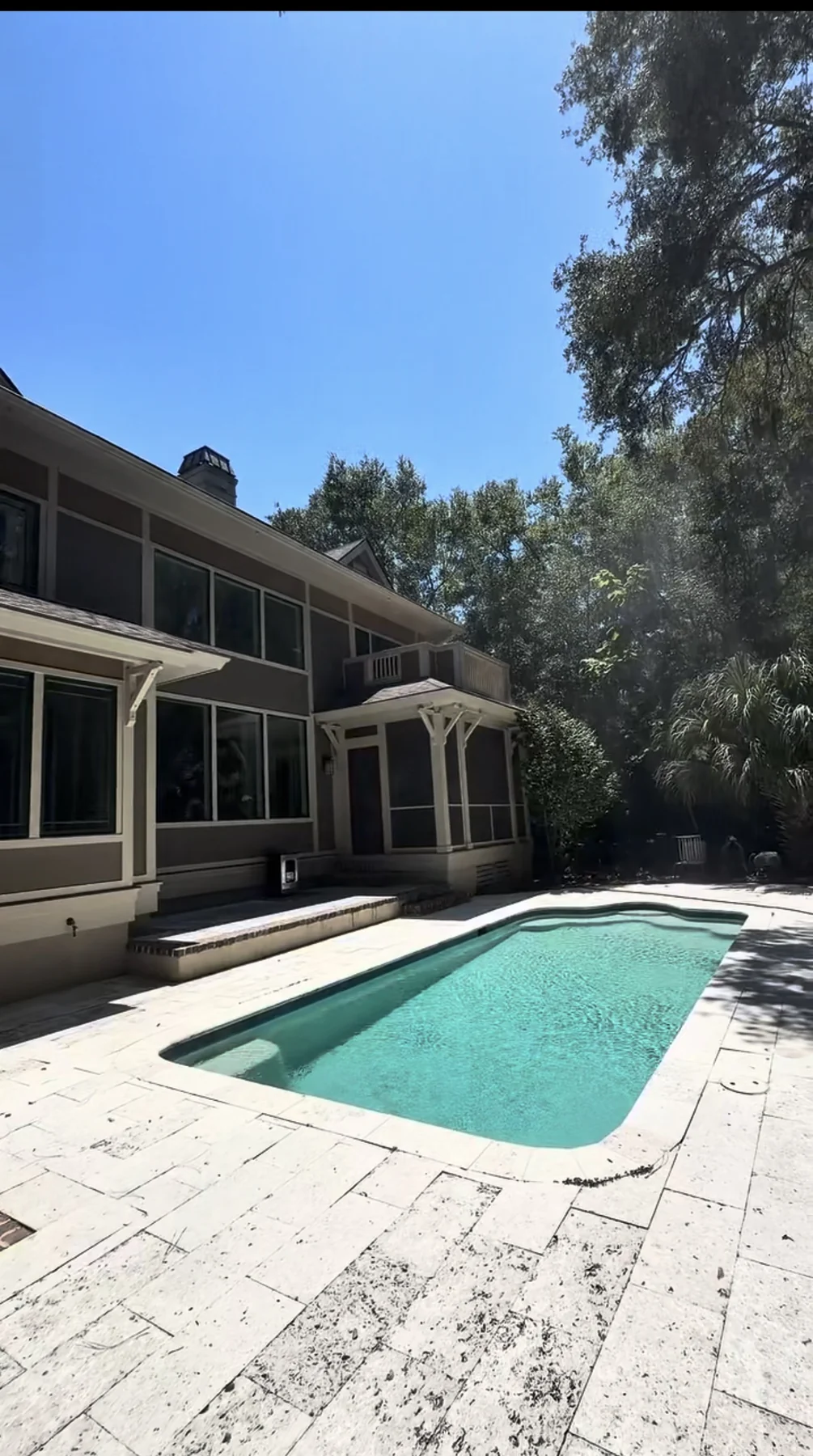 Pool deck and exterior property after CEHER Group exterior cleaning