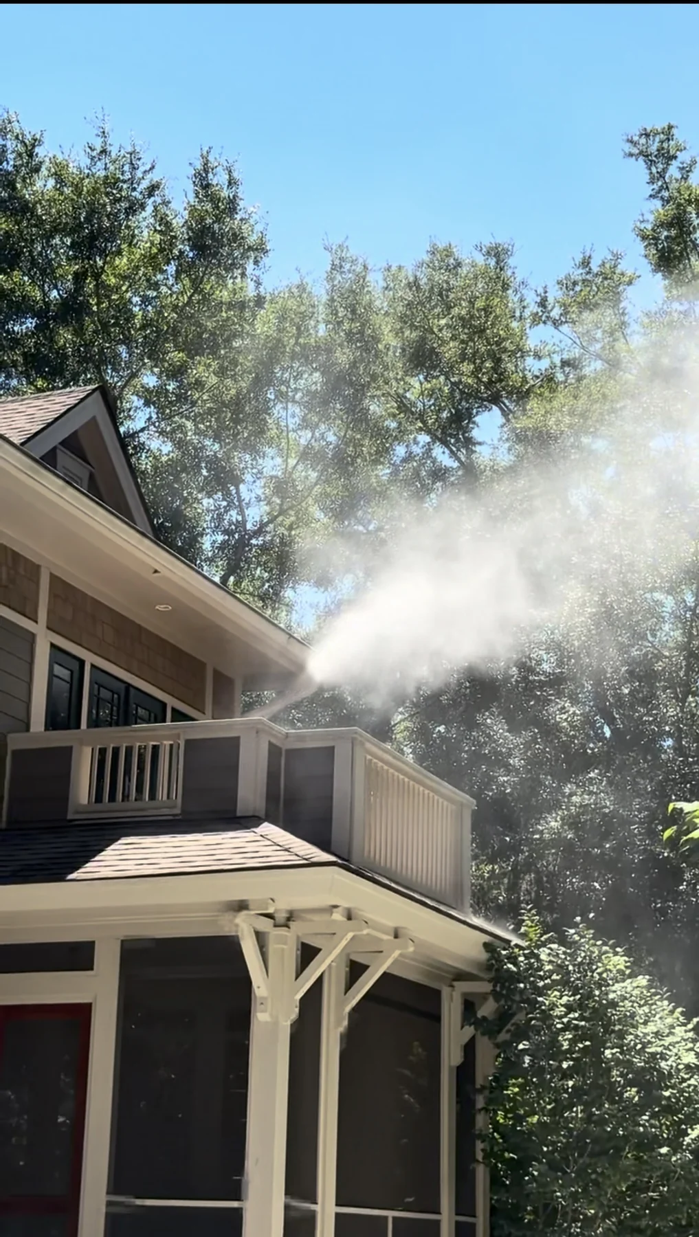 CEHER Group soft washing exterior of a home